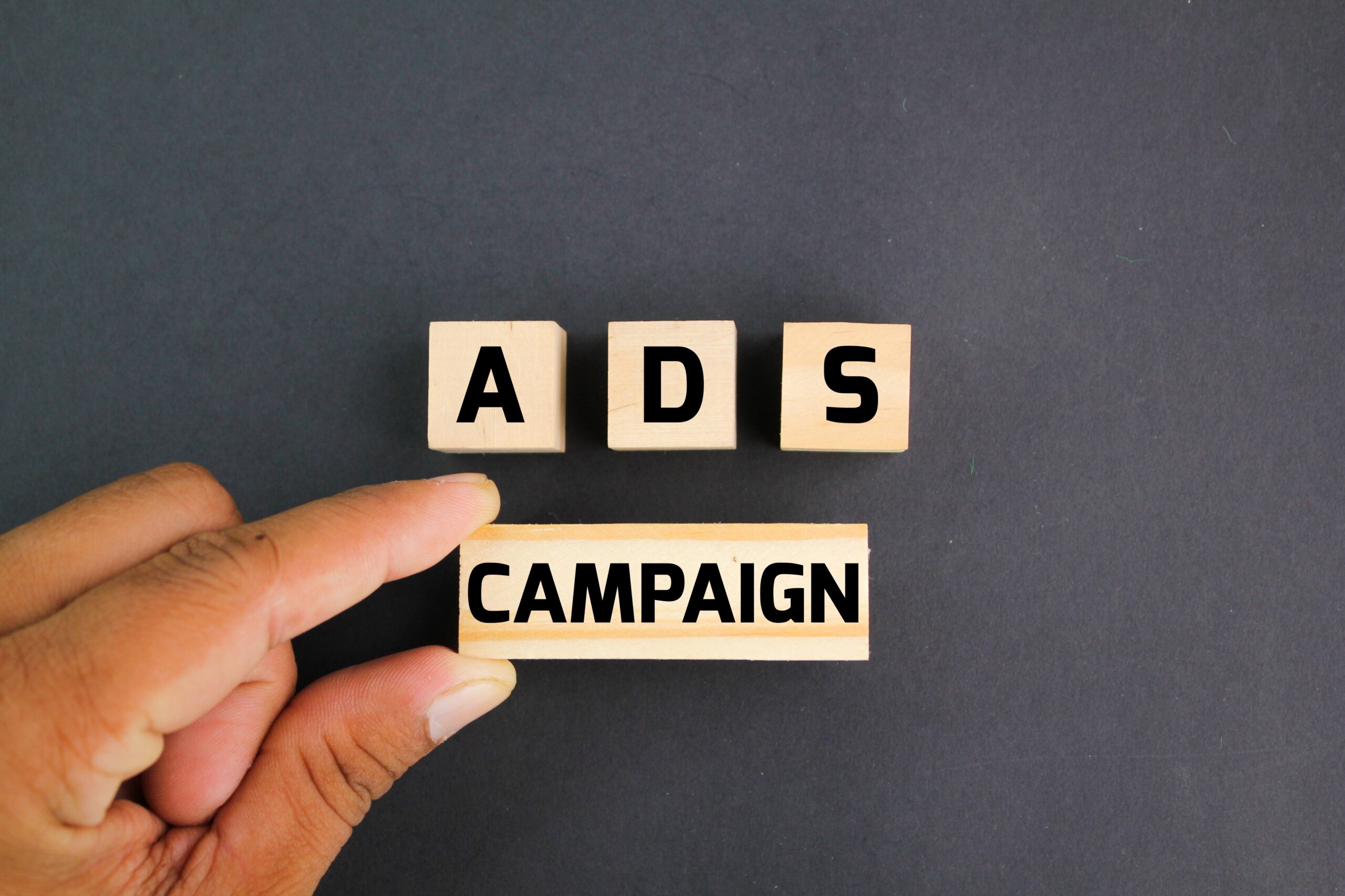 ads-campaign-represented-with-wooden-blocks-on-sur-2026-03-20-00-48-37-utc